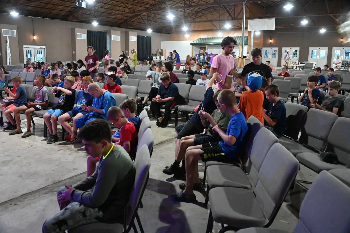The tabernacle filled with campers seated for a service