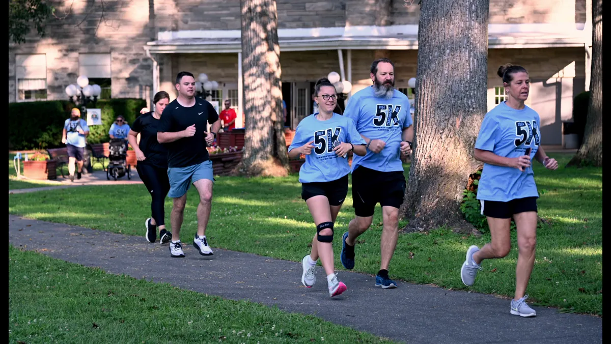 Runners on the camp road during the annual 5K